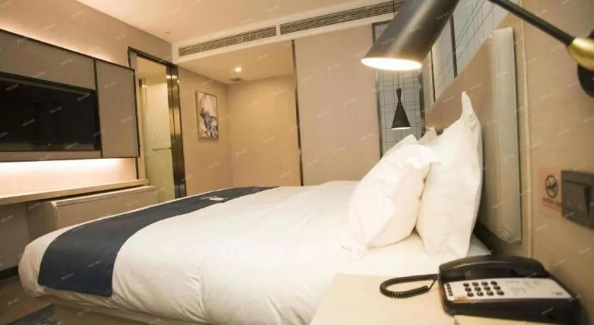 Bed in Echarm Hotel Changchun Jiutai District Government Railway Station