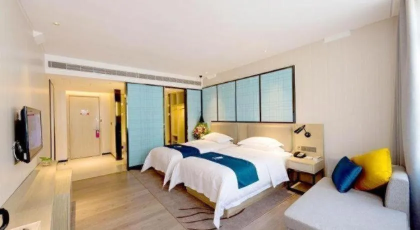 Bed in Echarm Hotel Changchun Jiutai District Government Railway Station