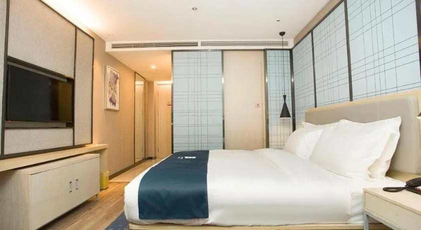 Bed in Echarm Hotel Changchun Jiutai District Government Railway Station