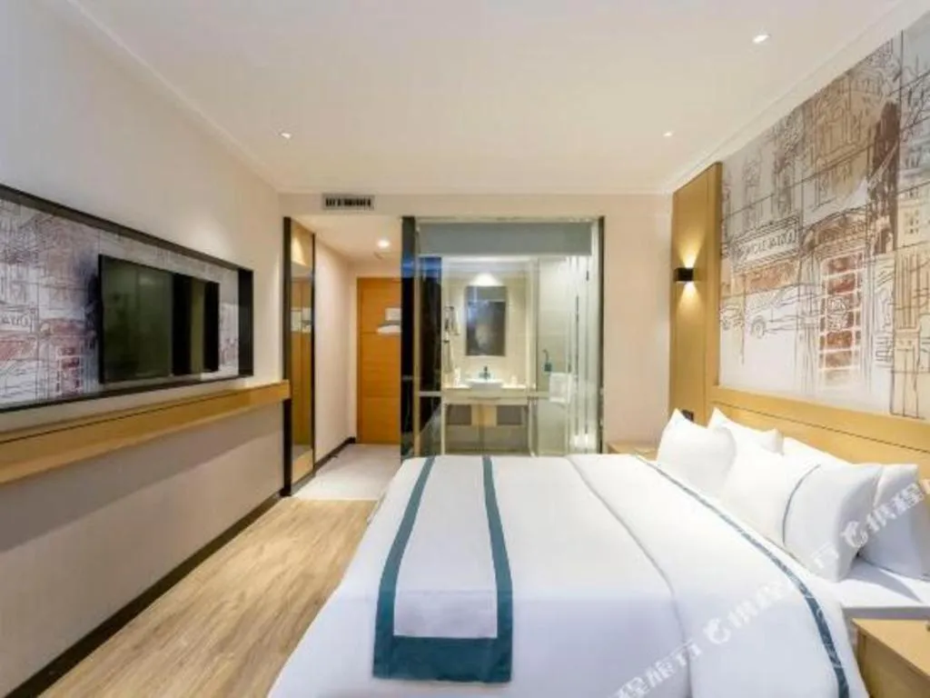 Bed in City Comfort Inn Yulin Youth Square 1st People's Hospital