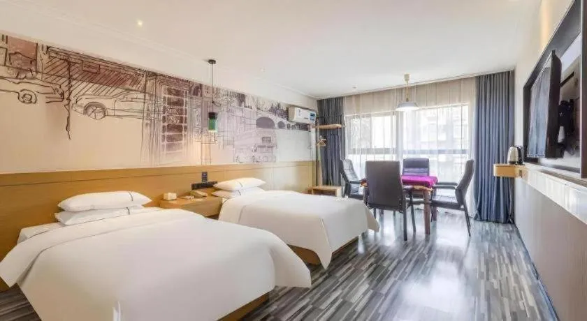 Bed in City Comfort Inn Wuhan Dream Times Baotong Temple Metro Station