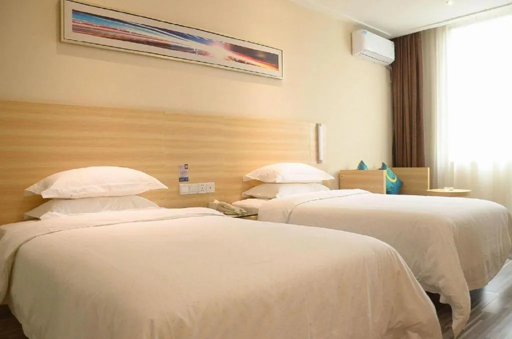 Bed in City Comfort Inn Suizhou Lieshan Avenue