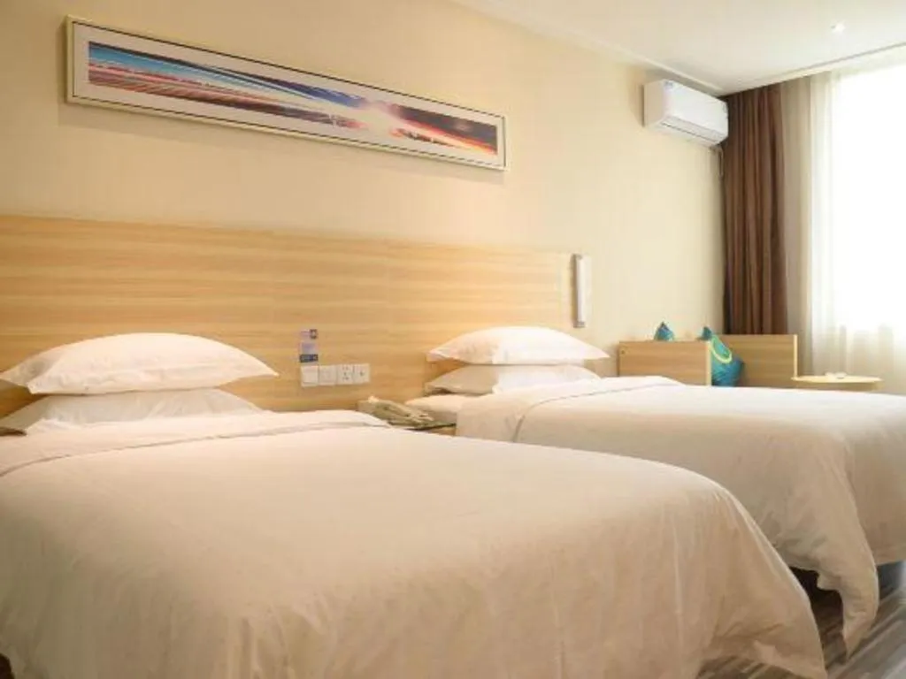 Bed in City Comfort Inn Suizhou Lieshan Avenue