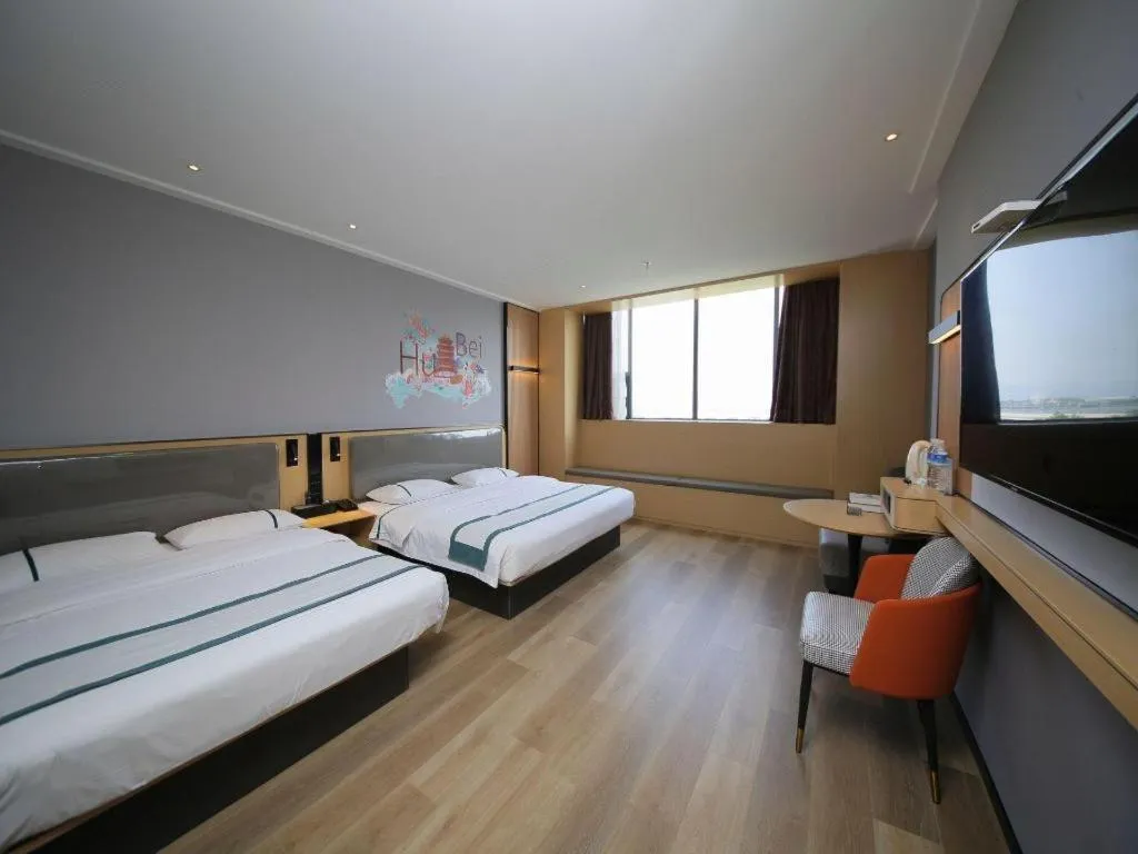 Bed in City Comfort Inn Huangshi Yangxin Mingyuewan Park
