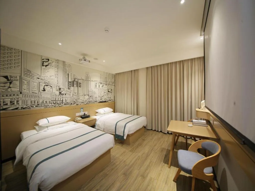 Bed in City Comfort Inn Huangshi Yangxin Mingyuewan Park