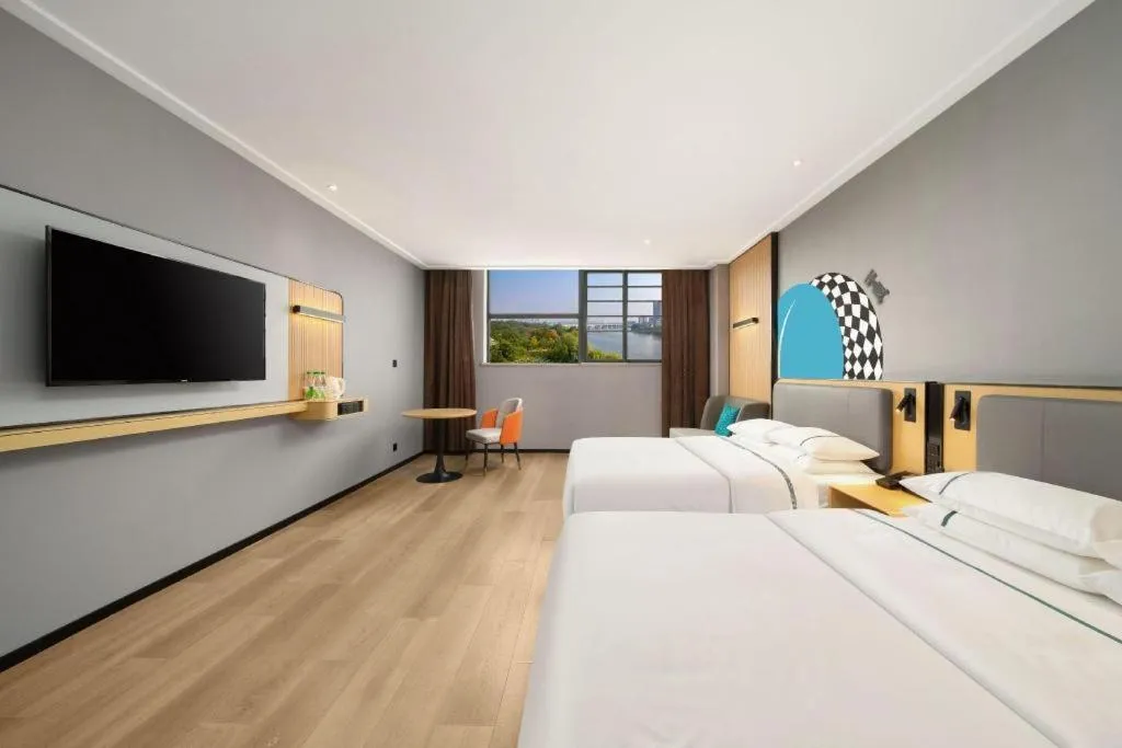 Bed in City Comfort Inn Huangshi Yangxin Mingyuewan Park