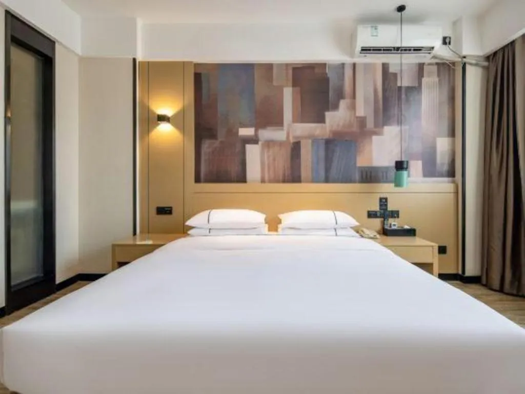 Bed in City Comfort Inn Liuzhou Gubu Street Ma'anshan Park