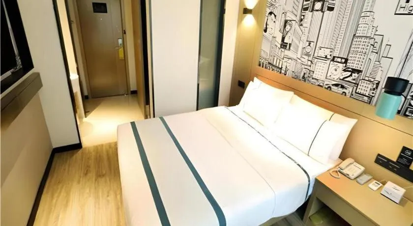 Bed in City Comfort Inn Liuzhou Gubu Street Ma'anshan Park