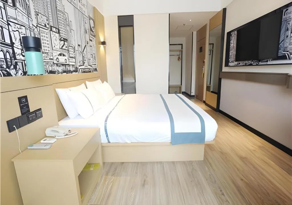 Bed in City Comfort Inn Liuzhou Gubu Street Ma'anshan Park