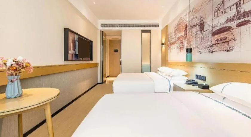 Bed in City Comfort Inn Zhaoqing Qixingyan Yihua Plaza Agile City