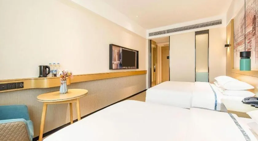 Bed in City Comfort Inn Zhaoqing Qixingyan Yihua Plaza Agile City