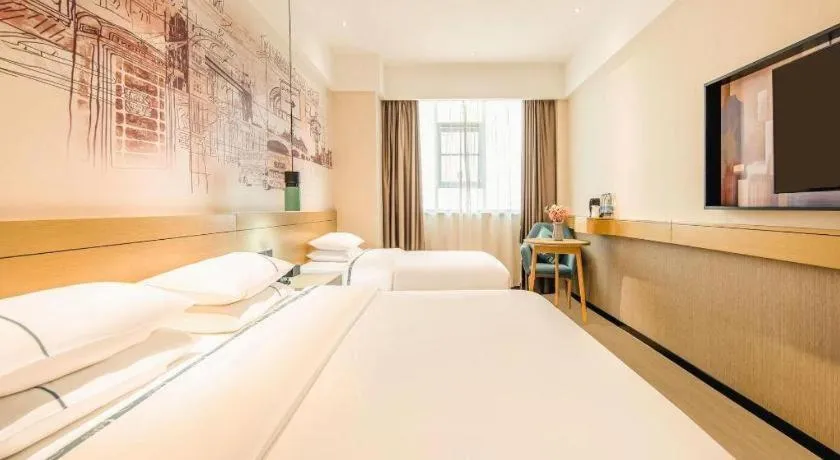 Bed in City Comfort Inn Zhaoqing Qixingyan Yihua Plaza Agile City