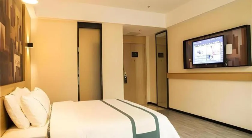 Bed in City Comfort Inn Maoming Xinyi Donghuicheng