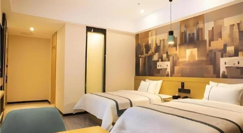 Bed in City Comfort Inn Maoming Xinyi Donghuicheng