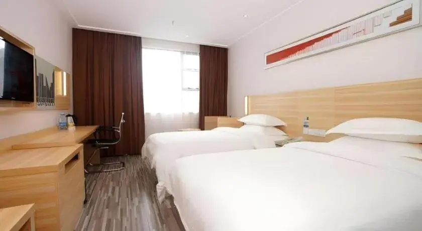 Bed in City Comfort Inn Heyuan Longchuan Bus Station Bed in City Comfort Inn Heyuan Longchuan Bus Station