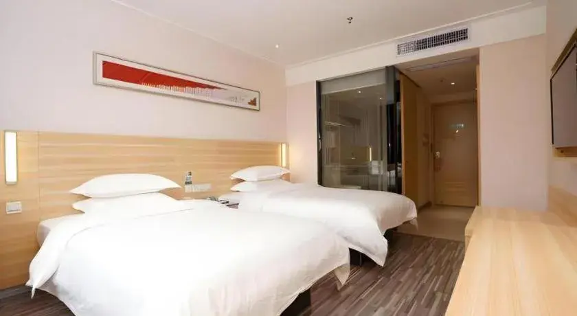 Bed in City Comfort Inn Heyuan Longchuan Bus Station Bed in City Comfort Inn Heyuan Longchuan Bus Station