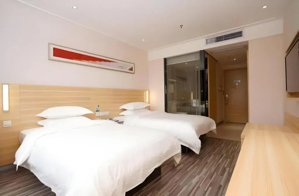 Bed in City Comfort Inn Heyuan Longchuan Bus Station Bed in City Comfort Inn Heyuan Longchuan Bus Station