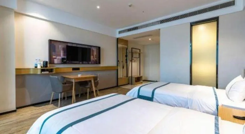 Bed in City Comfort Inn Dongguan Gaobu Avenue