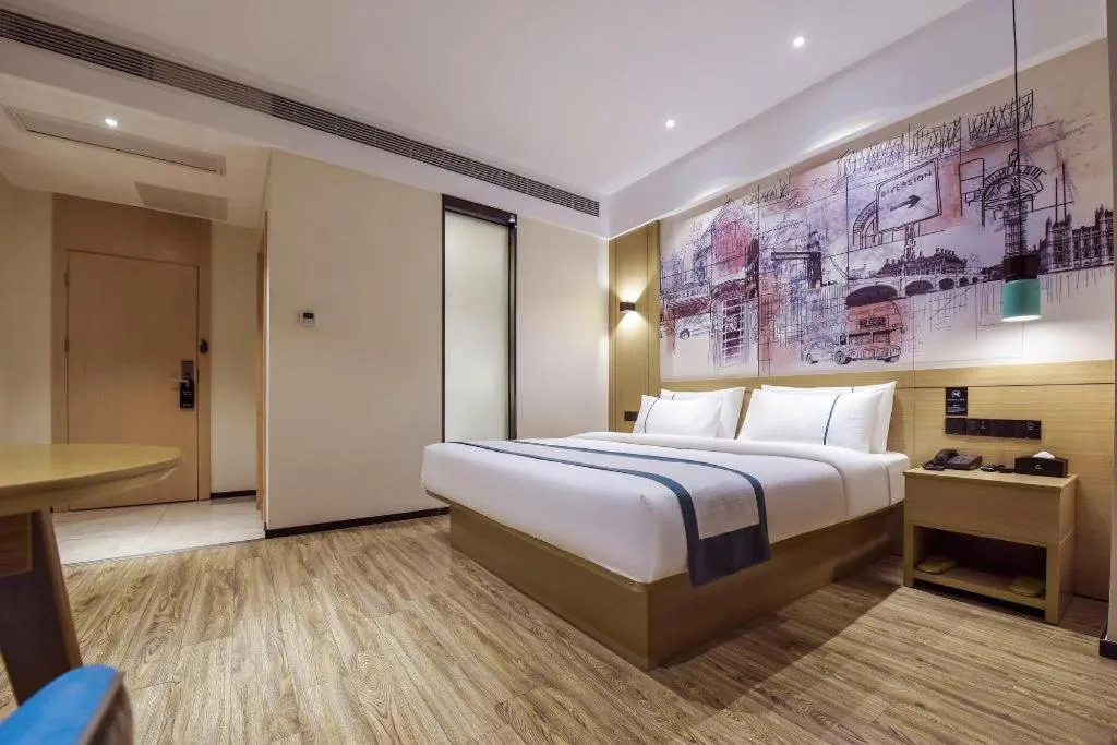 Bed in City Comfort Inn Dongguan Gaobu Avenue