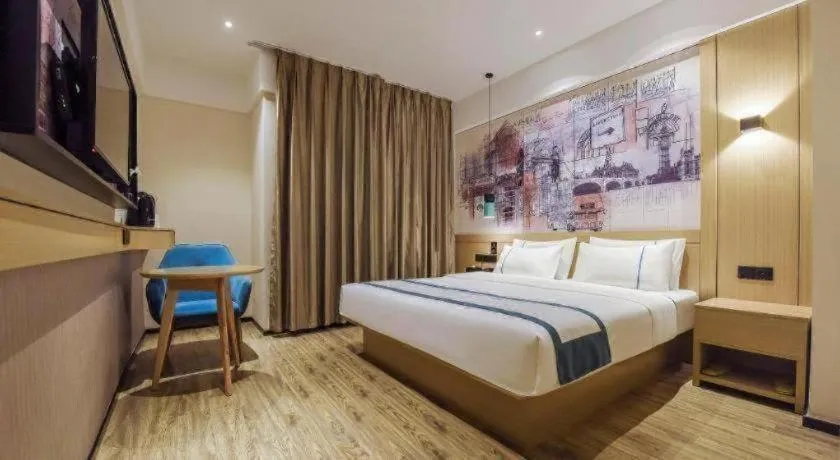 Bed in City Comfort Inn Dongguan Gaobu Avenue