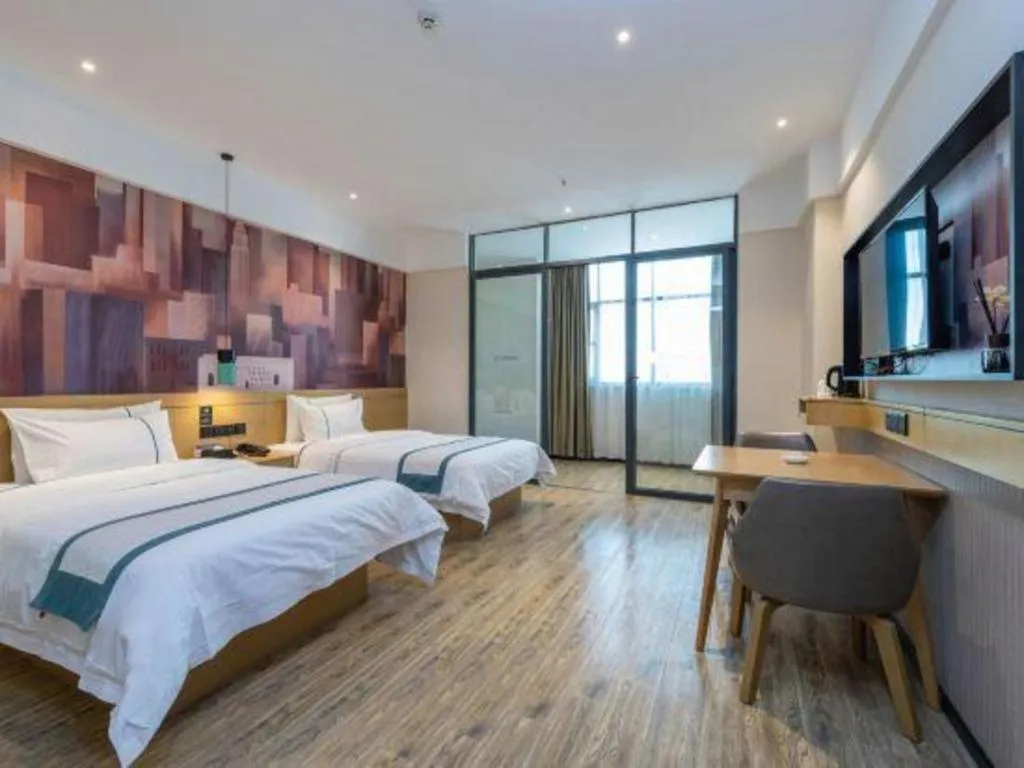 Bed in City Comfort Inn Dongguan Gaobu Avenue