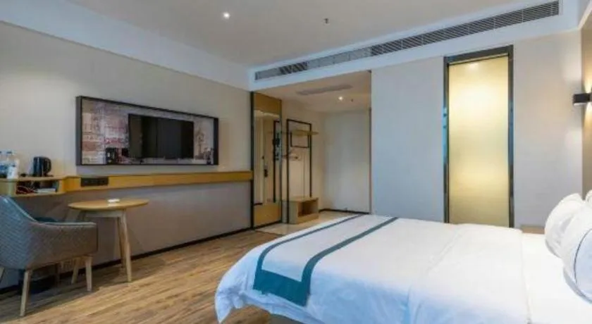 Bed in City Comfort Inn Dongguan Gaobu Avenue