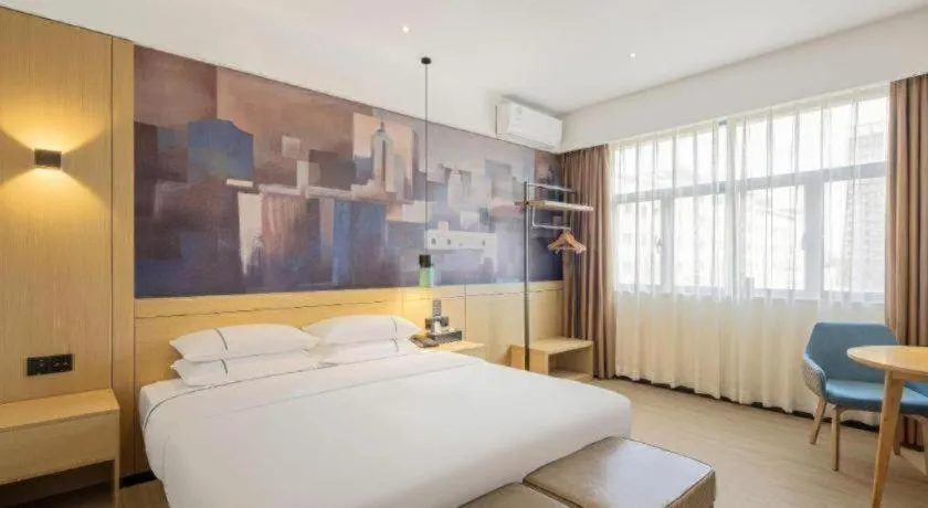 Bed in City Comfort Inn Dongguan Gaobu Avenue