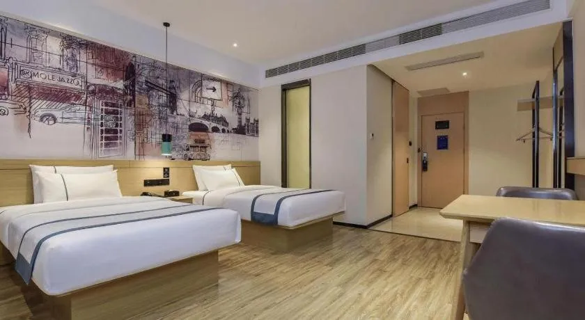 Bed in City Comfort Inn Dongguan Gaobu Avenue