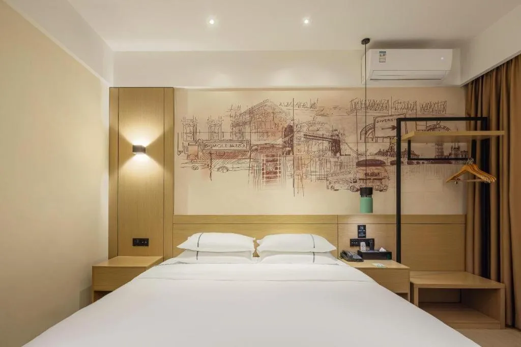 Bed in City Comfort Inn Dongguan Gaobu Avenue