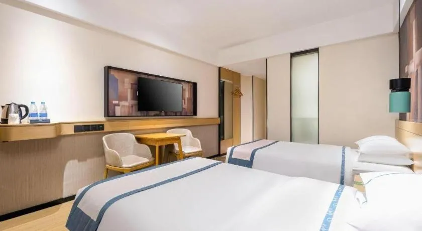 Bed in City Comfort Inn Dongfang Donghai Road Gymnasium Municipal Government