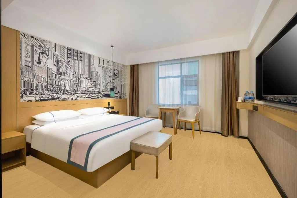 Bed in City Comfort Inn Dongfang Donghai Road Gymnasium Municipal Government