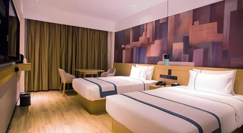 Bed in City Comfort Inn Dongfang Donghai Road Gymnasium Municipal Government