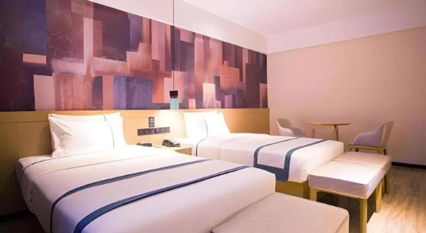 Bed in City Comfort Inn Dongfang Donghai Road Gymnasium Municipal Government