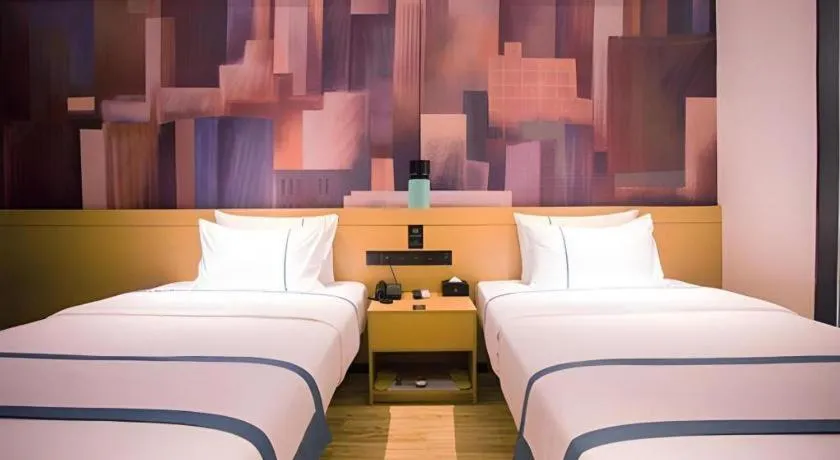 Bed in City Comfort Inn Dongfang Donghai Road Gymnasium Municipal Government