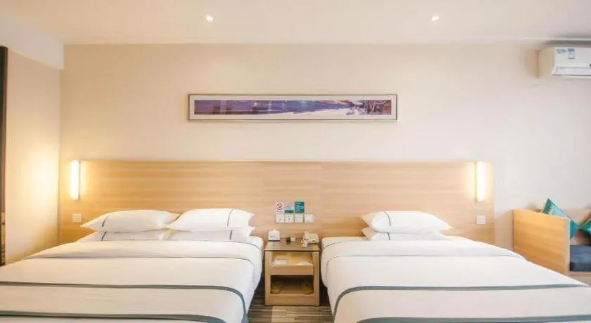 Bed in City Comfort Inn Yichang Dongshan Three Gorges University Shuiyuecheng