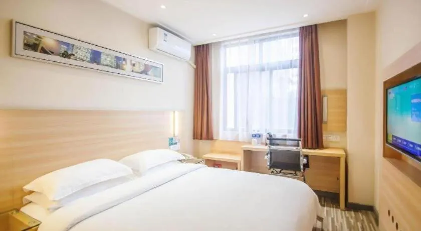 Bed in City Comfort Inn Yichang Dongshan Three Gorges University Shuiyuecheng