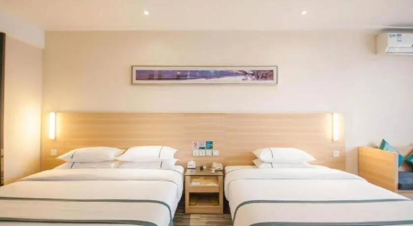 Bed in City Comfort Inn Yichang Dongshan Three Gorges University Shuiyuecheng