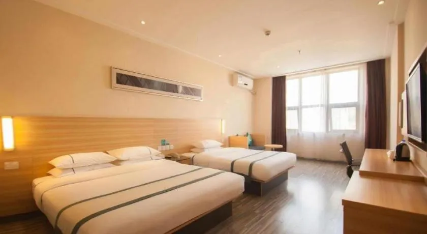 Bed in City Comfort Inn Yichang Dongshan Three Gorges University Shuiyuecheng