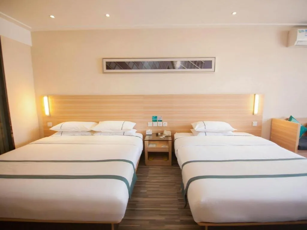 Bed in City Comfort Inn Yichang Dongshan Three Gorges University Shuiyuecheng