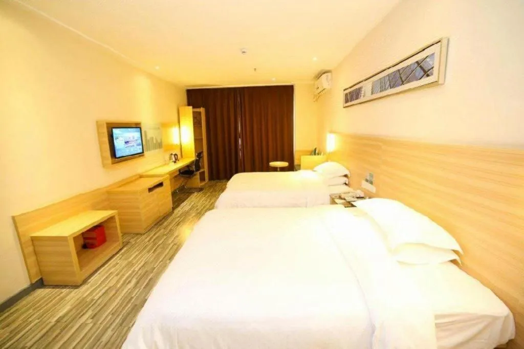 Bed in City Comfort Inn Yichang Dongshan Three Gorges University Shuiyuecheng