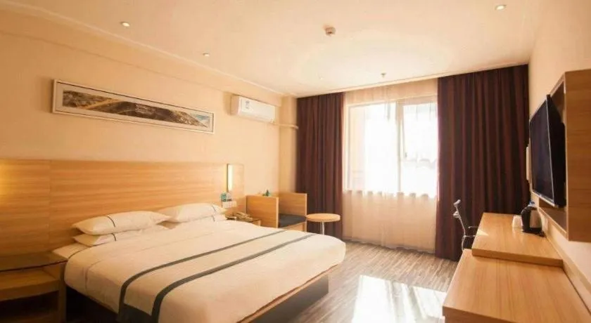 Bed in City Comfort Inn Yichang Dongshan Three Gorges University Shuiyuecheng