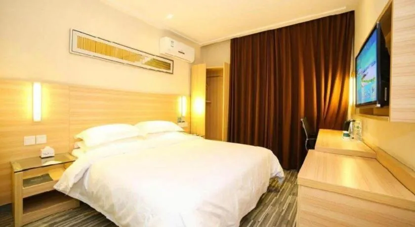 Bed in City Comfort Inn Yichang Dongshan Three Gorges University Shuiyuecheng