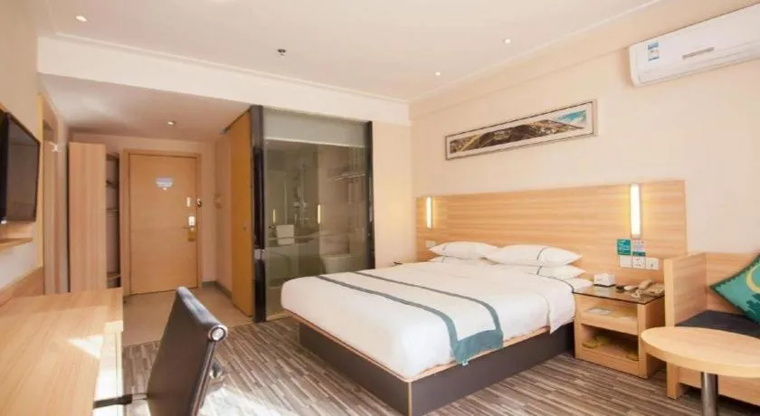 Bed in City Comfort Inn Yichang Dongshan Three Gorges University Shuiyuecheng