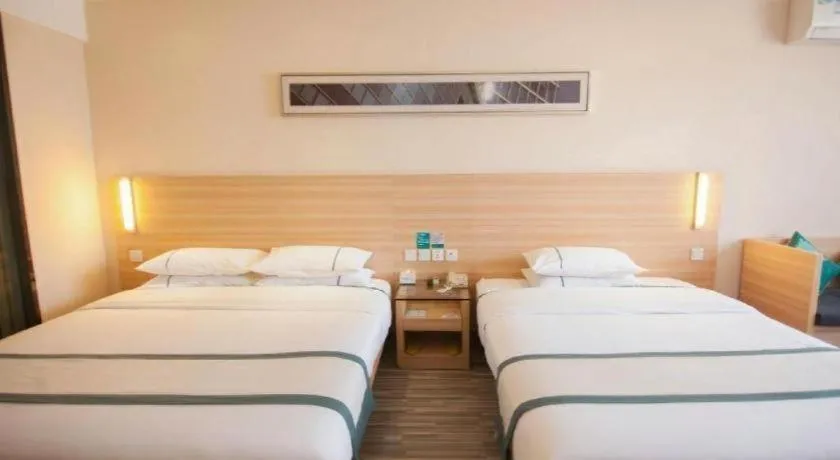 Bed in City Comfort Inn Yichang Dongshan Three Gorges University Shuiyuecheng