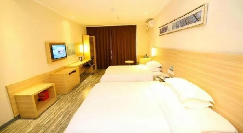 Bed in City Comfort Inn Yichang Dongshan Three Gorges University Shuiyuecheng