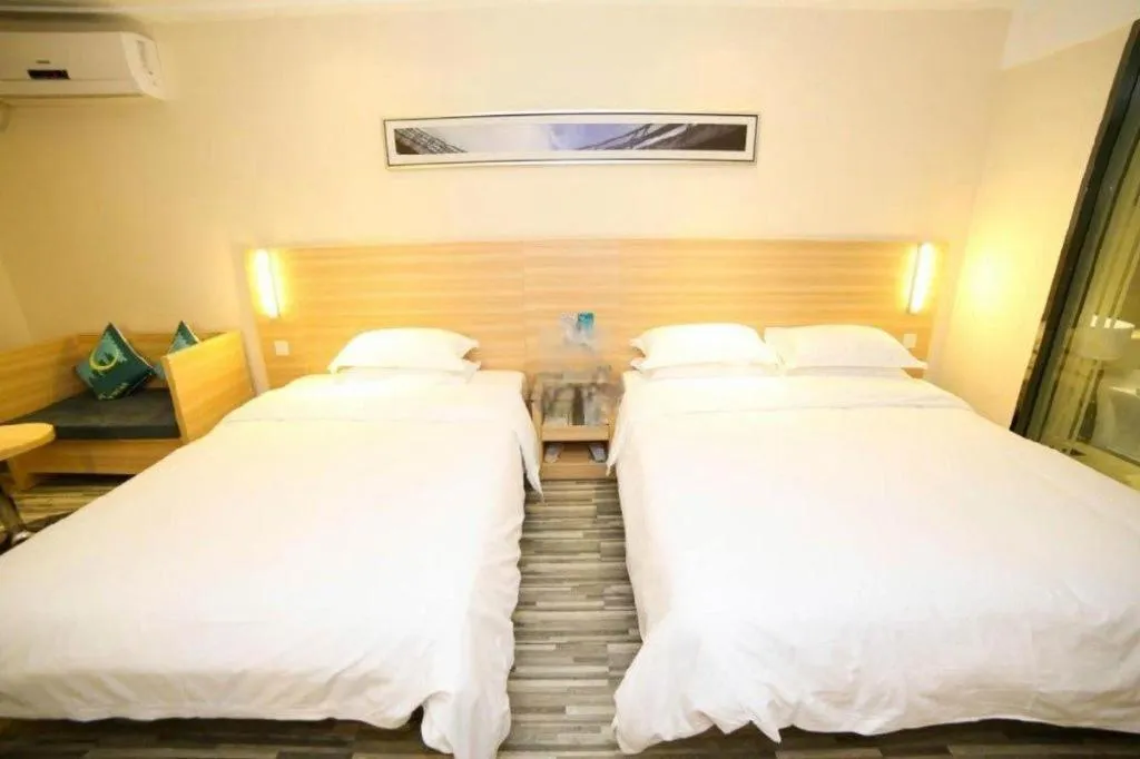 Bed in City Comfort Inn Yichang Dongshan Three Gorges University Shuiyuecheng