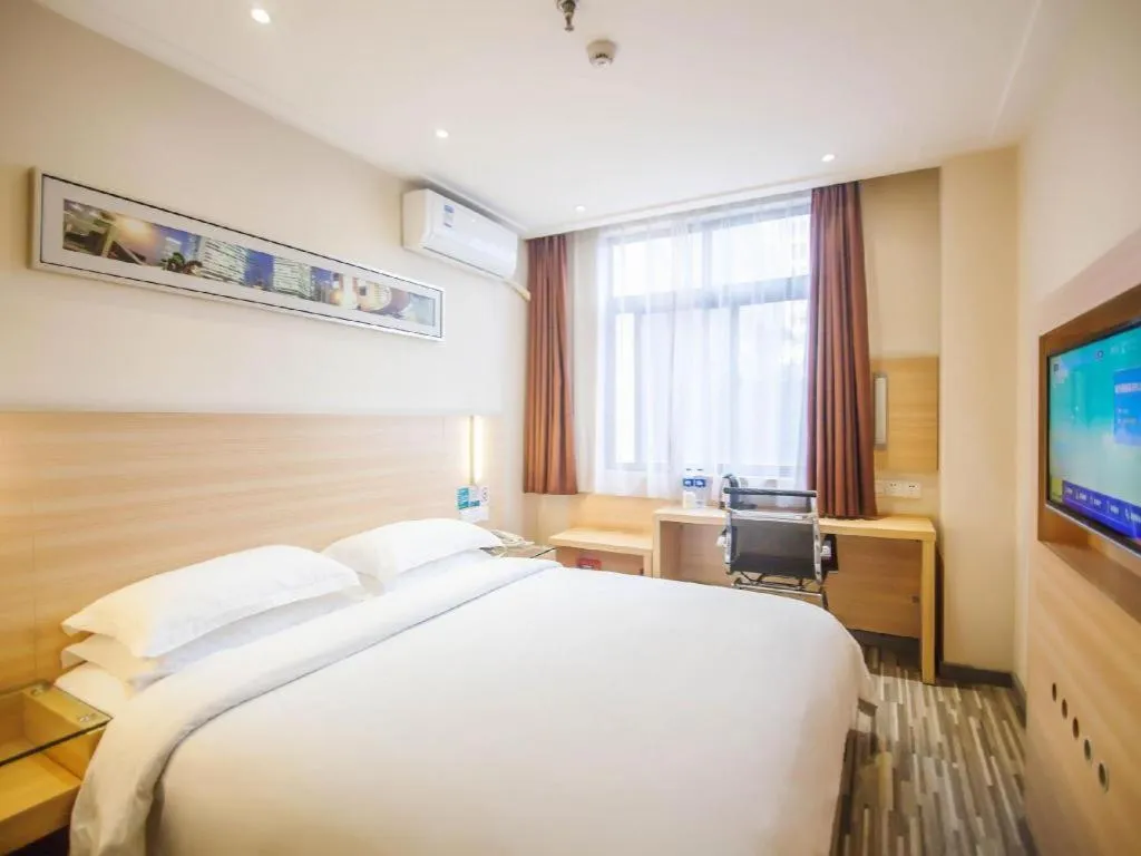 Bed in City Comfort Inn Yichang Dongshan Three Gorges University Shuiyuecheng