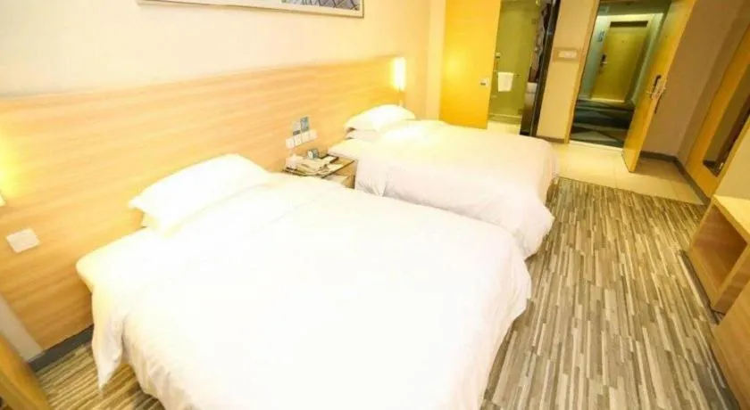 Bed in City Comfort Inn Yichang Dongshan Three Gorges University Shuiyuecheng