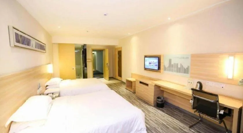 Bed in City Comfort Inn Yichang Dongshan Three Gorges University Shuiyuecheng