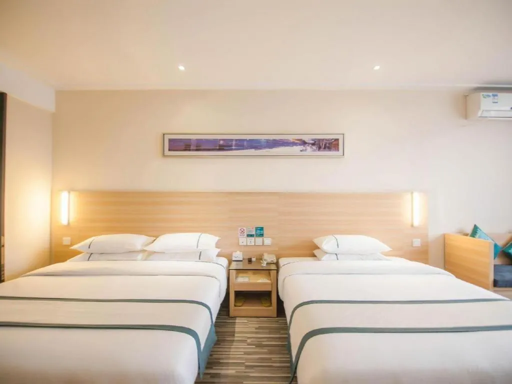 Bed in City Comfort Inn Yichang Dongshan Three Gorges University Shuiyuecheng